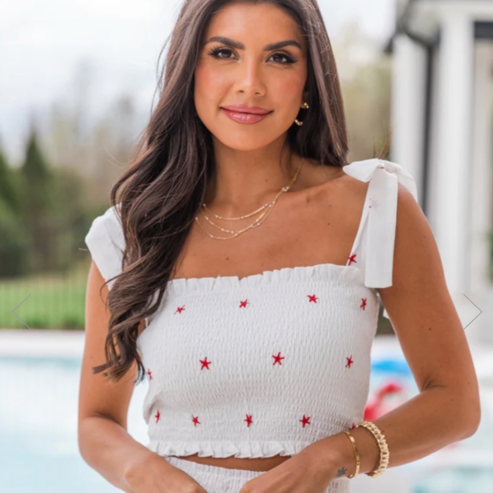 WHEN STARS ALIGN IVORY AND RED STARS SMOCKED TIE STRAP TANK